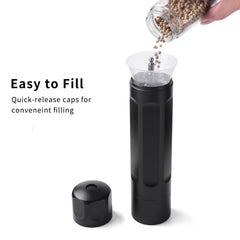 Pepper grinder includes cleaning brush for maintenance