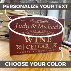 Hand-painted deep black wood wine cellar sign with carved reveal