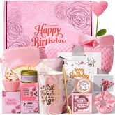 pink birthday gift box containing multiple gifts for women
