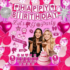 Pink foil balloons and tableware for celebration