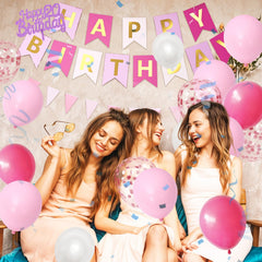 Pink fringe curtain decor for birthday party setup