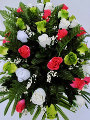 Saddle with adjustable legs and rubber feet protects grave marker