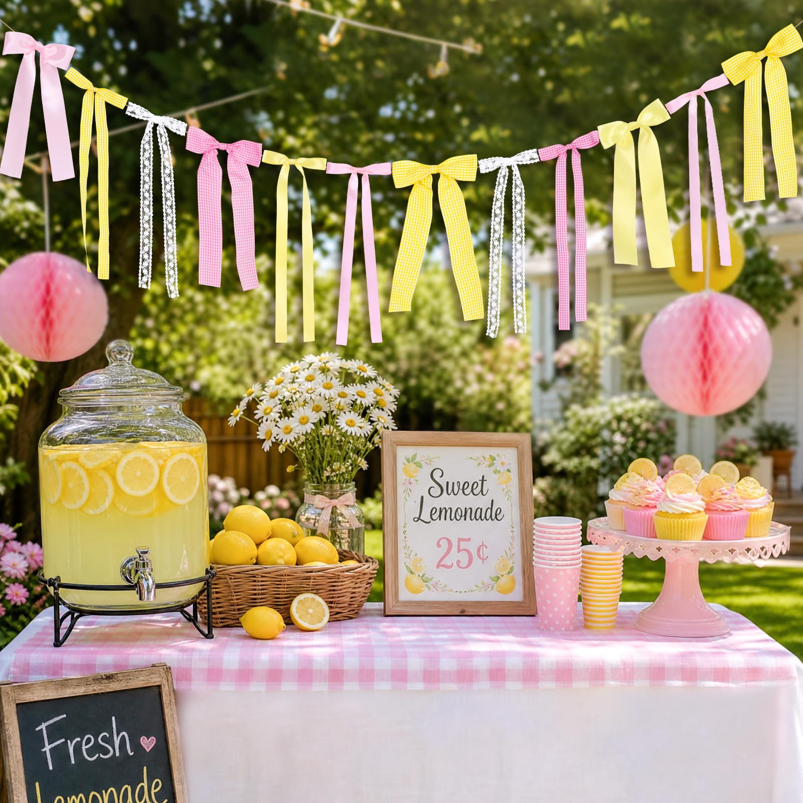Close up of Pink Lemon Yellow Ribbon Bow Garland ribbons on pink and lemon palette