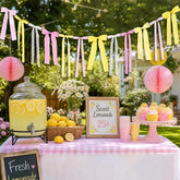 Close up of Pink Lemon Yellow Ribbon Bow Garland ribbons on pink and lemon palette