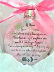 Pink satin bow on memorial ornament ready for gifting