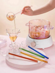 Pink tinted glass saucepan monitoring visibility