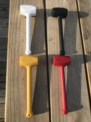 White plastic crab mallet from set of four