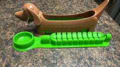 Slicer creates small pieces of hotdog image