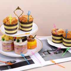Plastic sword toothpicks for cocktails and hors doeuvres