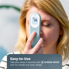 No-contact infrared thermometer being used on a child