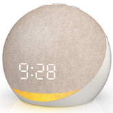 Putty sound machine alarm clock on nightstand
