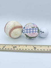 Hand-cut fabric strips on quilt-pattern orbs