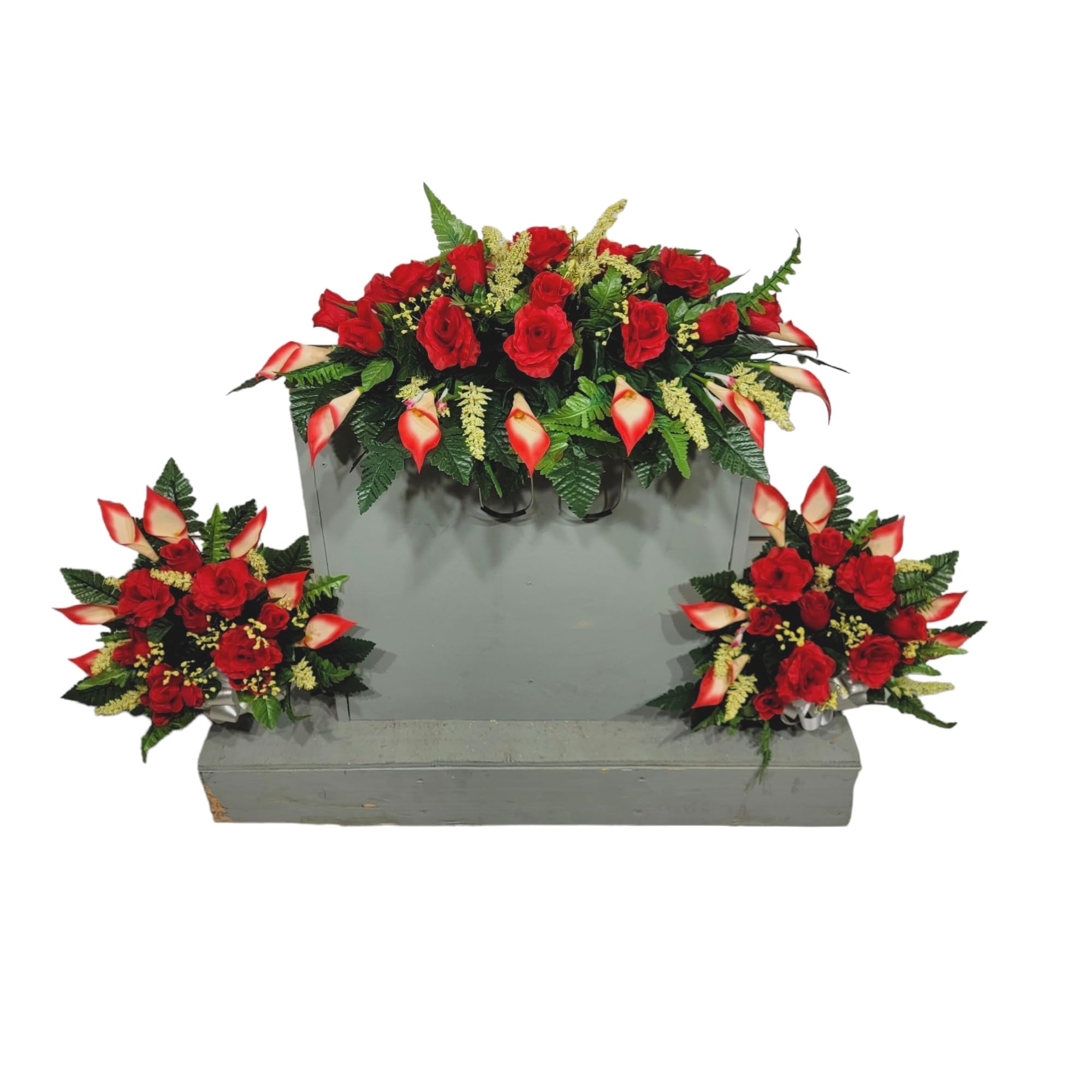 Realistic artificial cemetery flowers with red roses and calla lilies