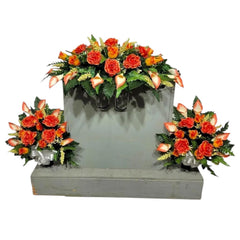 realistic artificial cemetery flowers orange roses and calla lilies