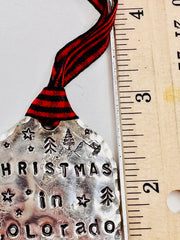 Red and black buffalo check ribbon accent on ornament