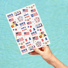 Gold metallic accents among red white blue tattoos
