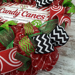 Red white mesh wreath with ribbons and accents