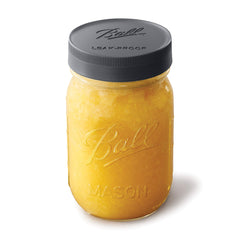 Lid with ridged edge for secure grip on regular mouth jars