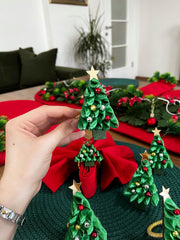 Rustic Christmas decor napkin rings arranged for dining
