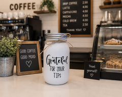 32 oz quart size tip jar stands about 7 inches tall