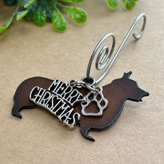Rustic metal dog ornament with paw print charms