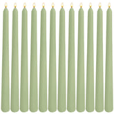sage green taper candles 12 pack on table
