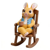 sangeren resin bunny figurine on rocking chair with coffee cup