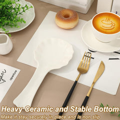 Scalloped edge spoon rest on kitchen counter