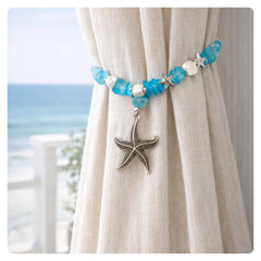Close up of sea glass beads and shell accents on curtain tiebacks