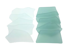 Sea glass place cards in sea green shades with irregular shapes