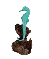 Seahorse Green Sculpture by John Perry on polished manzanita burl base
