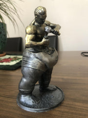 Desk display of Selfmade Man sculpture 16 cm