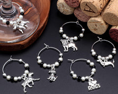 Dalmatian charm included among six silver wine glass charms with pearl detailing