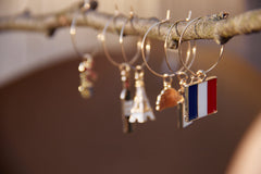 Wine glasses charms with Eiffel Tower and wine bottle motifs for Serendipity France collection