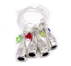 Set of 4 wine glass charms with silver-tone bottle design