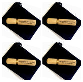 Set of four natural sandalwood cremation urns for travel