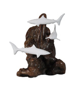 Shark Trio miniature sculpture by John Perry showing three 3 inch sharks circling a coral head