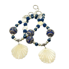 Seashell curtain tiebacks with navy blue beads