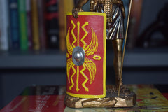 Antique bronze patina finish on centurion statue