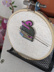 Magnetic needle minder for embroidery projects