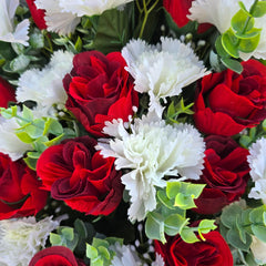 Foam filled plastic vase securing the arrangement