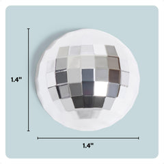 Silver disco ball magnets by U Brands on a refrigerator