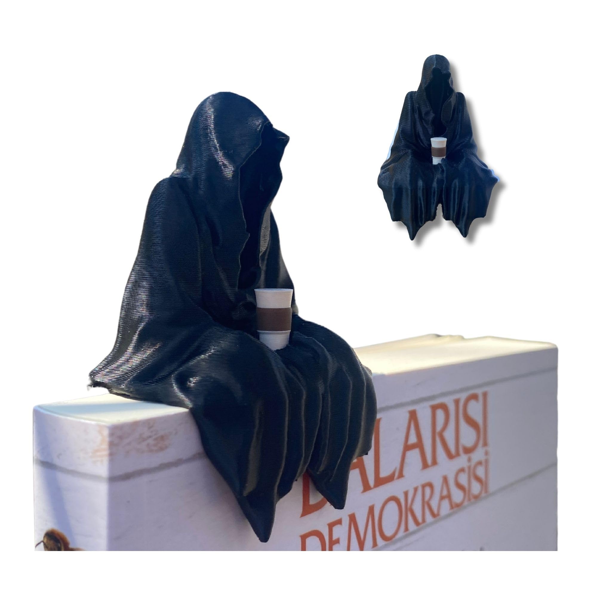 Sitting Ghost Figurine Holding Coffee on a desk display