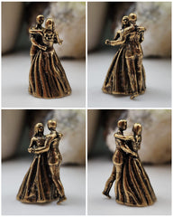 Small black gift pouch included with brass sculpture