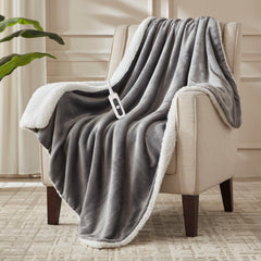 SNUGSUN heated blanket throw in London Grey 50x60 on bed