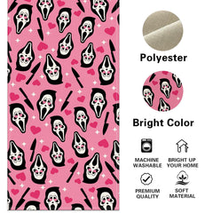 Close-up of spooky mask and knife print on pink runner