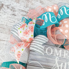 Spring color palette wreath coral grey teal white mesh close up