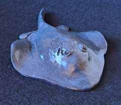 Stone cast stingray decor for shelf or desk