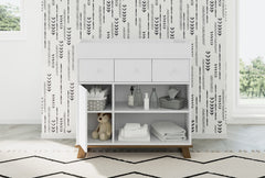 Open storage shelves beside the enclosed cabinet