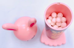 Strawberry flavored candy inside Bleach dispenser